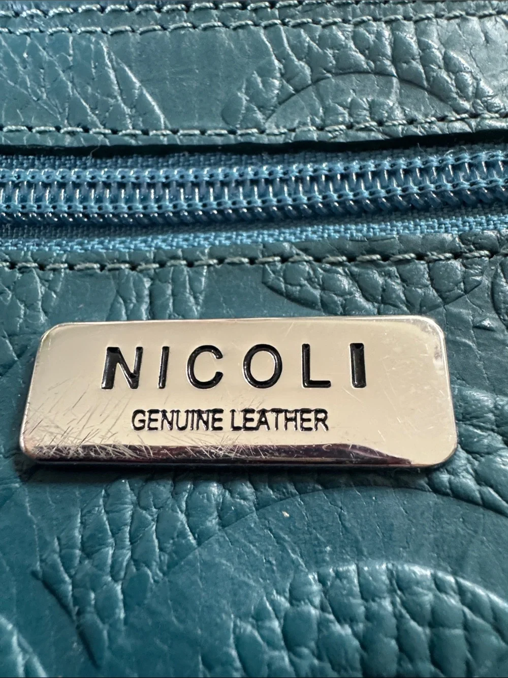 NICOLI Teal Blue Wristlet Clutch with Embossed Circles